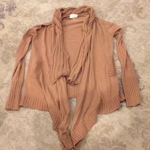 Tan wrap sweater with pockets and cableknit trim
